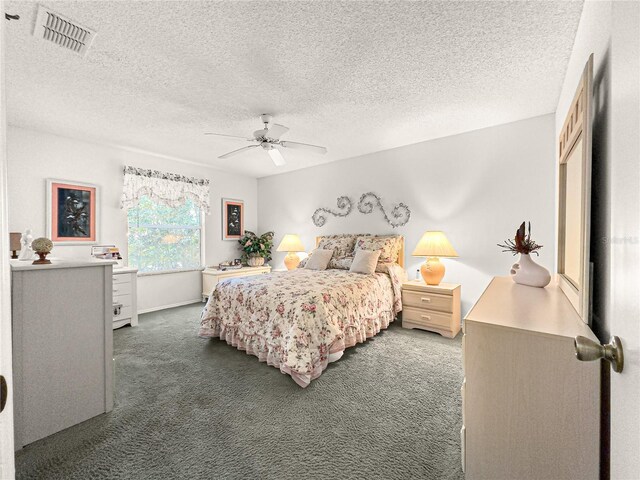 2102 Estevez Dr, Lady Lake, FL 32159 - bedroom with carpet floors, a textured ceiling, and a ceiling fan