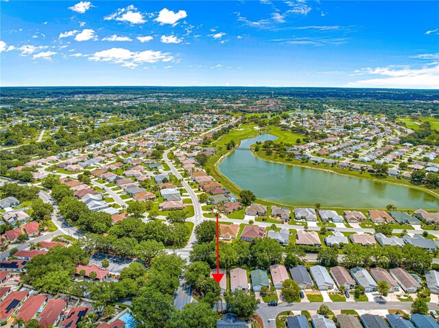 2102 Estevez Dr, Lady Lake, FL 32159 - aerial view of property's location with a large body of water and nearby suburban area