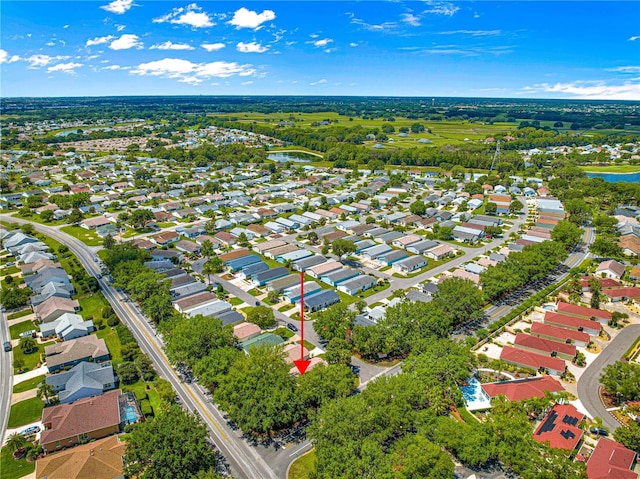 2102 Estevez Dr, Lady Lake, FL 32159 - aerial view of residential area featuring a large body of water