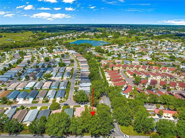2102 Estevez Dr, Lady Lake, FL 32159 - aerial view of property and surrounding area with a nearby body of water and nearby suburban area
