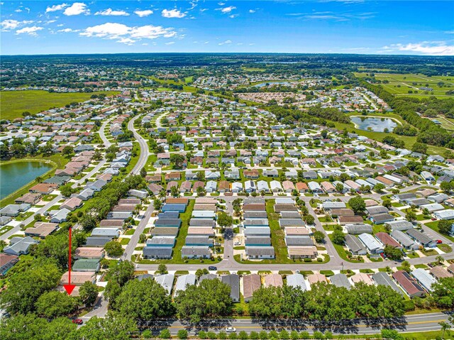2102 Estevez Dr, Lady Lake, FL 32159 - aerial view of residential area featuring a large body of water
