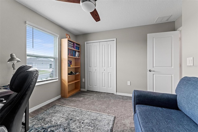 5354 Travertine St, Mount Dora, FL 32757 - carpeted home office featuring visible vents, a textured ceiling, baseboards, and ceiling fan