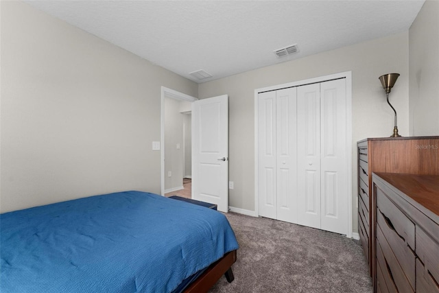 5354 Travertine St, Mount Dora, FL 32757 - carpeted bedroom featuring baseboards, visible vents, and a closet