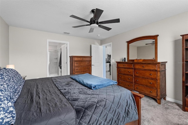 5354 Travertine St, Mount Dora, FL 32757 - bedroom with visible vents, baseboards, ceiling fan, connected bathroom, and carpet flooring