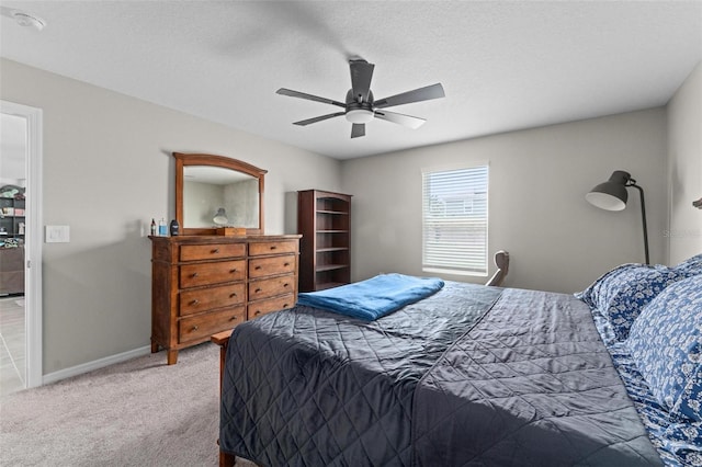 5354 Travertine St, Mount Dora, FL 32757 - bedroom featuring baseboards, ceiling fan, and light carpet