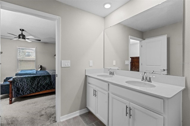 5354 Travertine St, Mount Dora, FL 32757 - full bathroom with a sink, baseboards, a ceiling fan, and ensuite bath