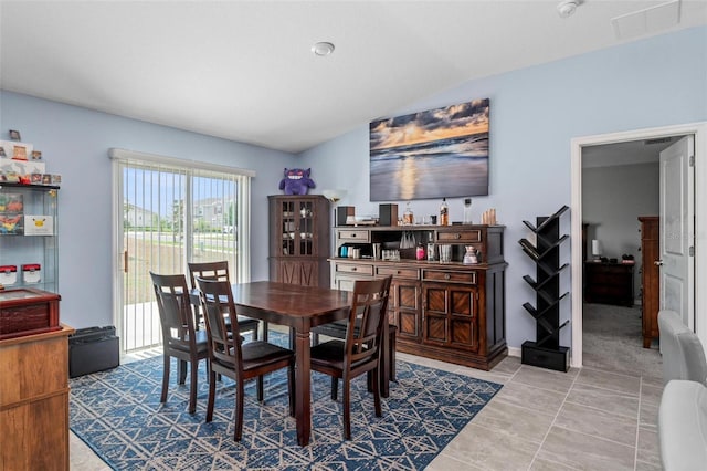 5354 Travertine St, Mount Dora, FL 32757 - tiled dining area with visible vents and lofted ceiling