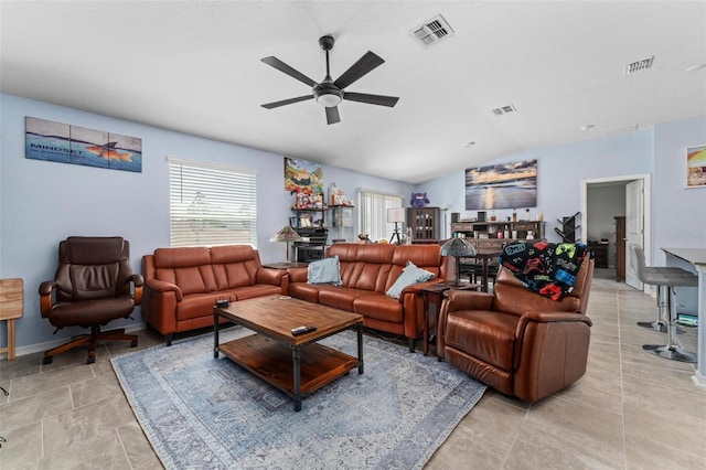 5354 Travertine St, Mount Dora, FL 32757 - living room featuring vaulted ceiling, a ceiling fan, and visible vents