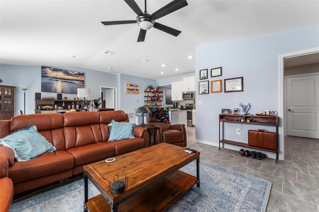 5354 Travertine St, Mount Dora, FL 32757 - living area featuring baseboards, ceiling fan, vaulted ceiling, and visible vents
