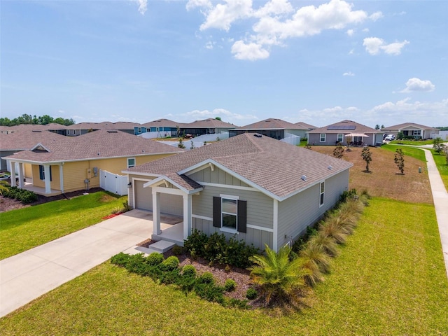 5354 Travertine St, Mount Dora, FL 32757 - view of front of property featuring a residential view, a shingled roof, a garage, board and batten siding, and a front yard