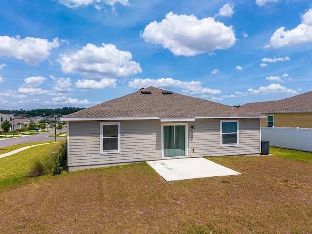 5354 Travertine St, Mount Dora, FL 32757 - rear view of property with a yard, a patio, fence, and a shingled roof