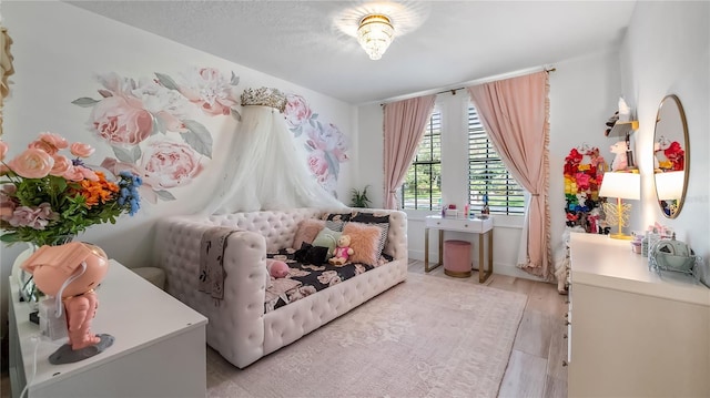 bedroom featuring light wood-type flooring