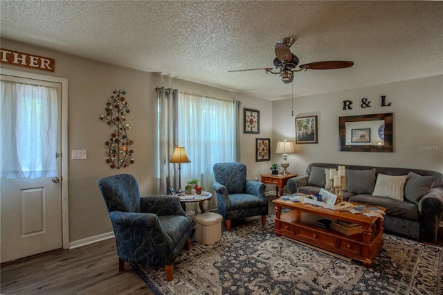 616 Third Ave, Lady Lake, FL 32159 - living room with a textured ceiling, ceiling fan, and wood finished floors