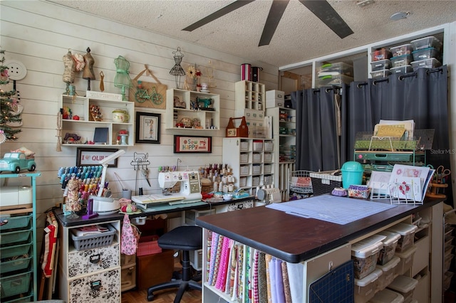 616 Third Ave, Lady Lake, FL 32159 - home office featuring a ceiling fan, a textured ceiling, and wooden walls