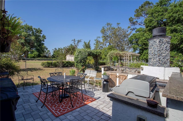 616 Third Ave, Lady Lake, FL 32159 - view of patio / terrace featuring fence, outdoor dining area, and area for grilling