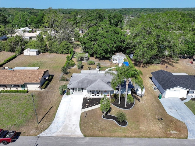 616 Third Ave, Lady Lake, FL 32159 - drone / aerial view with a view of trees