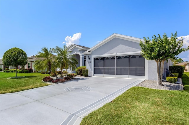 ranch-style home with an attached garage, driveway, stucco siding, and a front yard