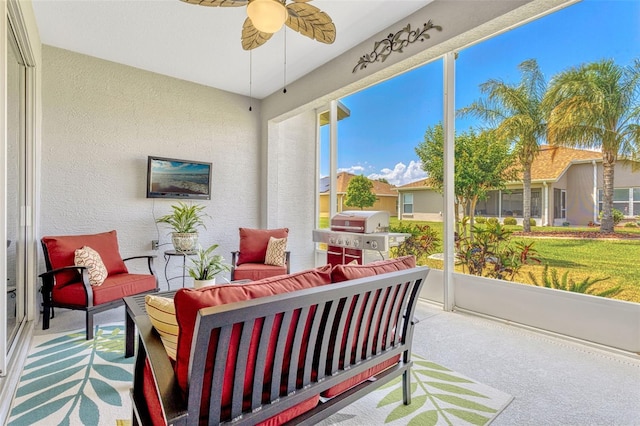 sunroom featuring carpet