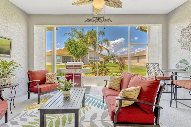 sunroom featuring a residential view