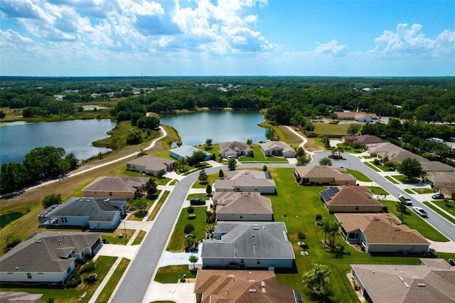 aerial view with a residential view and a water view