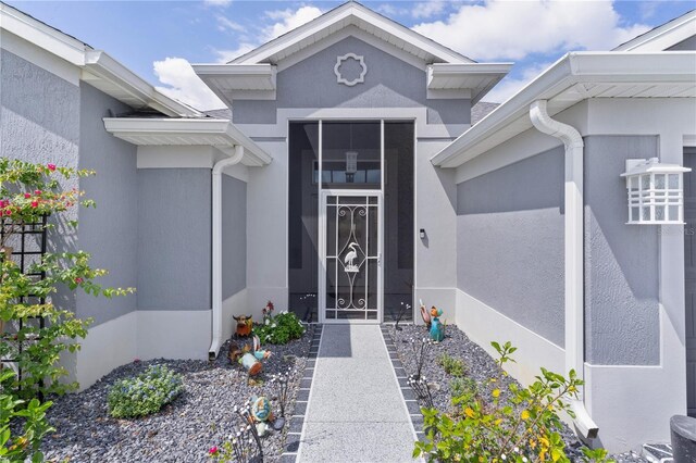 2129 Landrea Loop, The Villages, FL 32163 - view of exterior entry with stucco siding