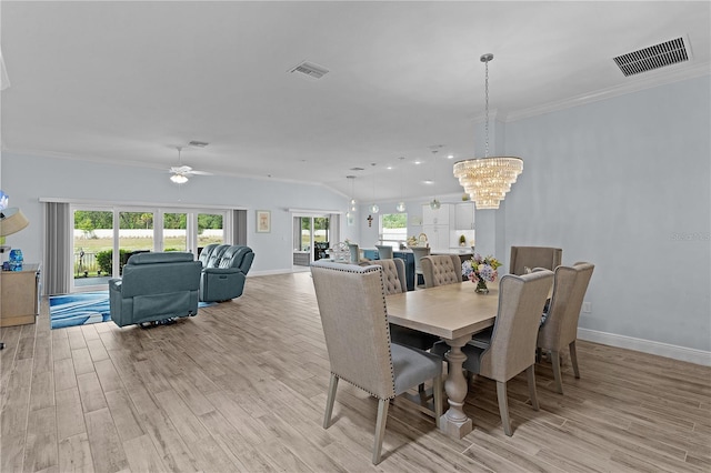 2129 Landrea Loop, The Villages, FL 32163 - dining room with crown molding, baseboards, visible vents, and light wood finished floors