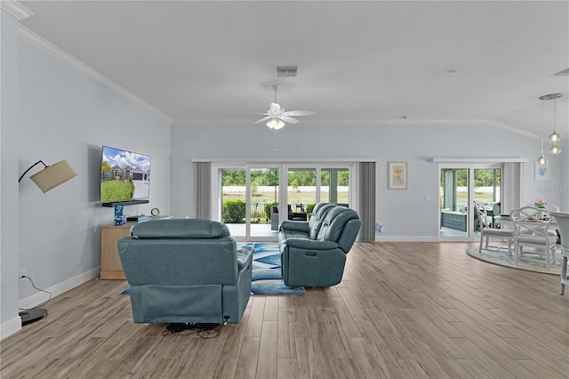 2129 Landrea Loop, The Villages, FL 32163 - living area featuring light wood finished floors, a ceiling fan, baseboards, visible vents, and ornamental molding