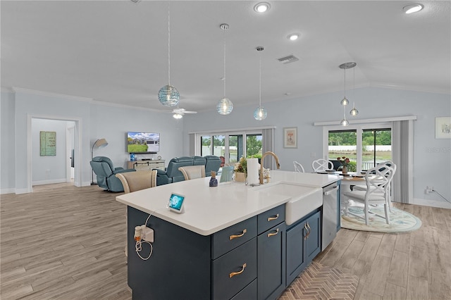 2129 Landrea Loop, The Villages, FL 32163 - kitchen with ceiling fan, a sink, light countertops, stainless steel dishwasher, and visible vents