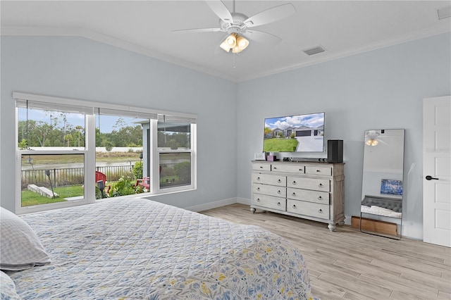 2129 Landrea Loop, The Villages, FL 32163 - bedroom with visible vents, a water view, multiple windows, and light wood-type flooring