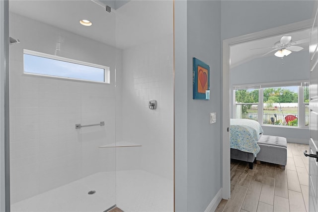 2129 Landrea Loop, The Villages, FL 32163 - full bathroom with baseboards, tiled shower, and ensuite bathroom