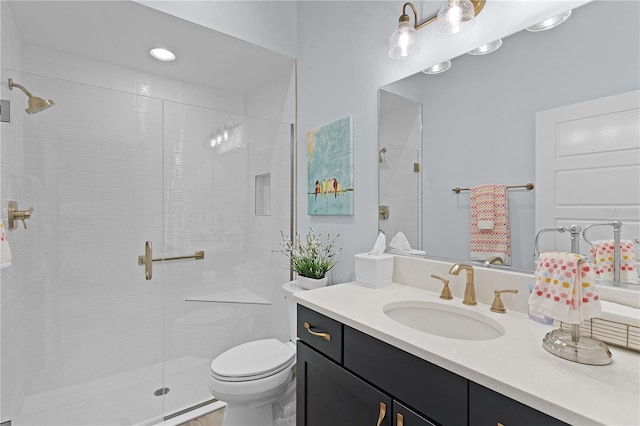 2129 Landrea Loop, The Villages, FL 32163 - bathroom with vanity, a stall shower, and toilet