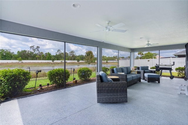 2129 Landrea Loop, The Villages, FL 32163 - sunroom / solarium with a ceiling fan, a water view, and an outdoor living space