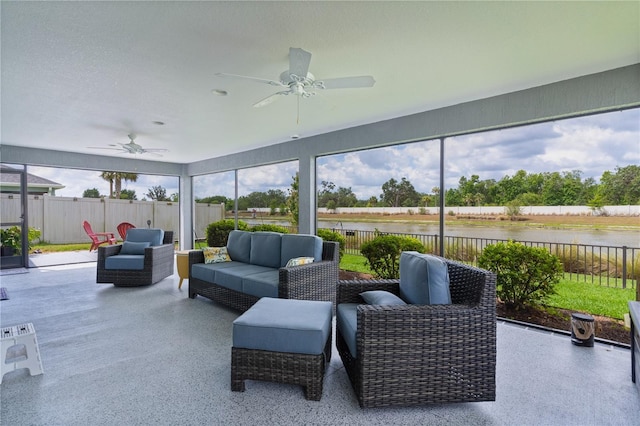 2129 Landrea Loop, The Villages, FL 32163 - sunroom / solarium with a ceiling fan, a water view, and an outdoor living space