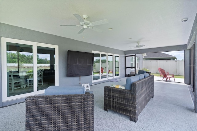 2129 Landrea Loop, The Villages, FL 32163 - view of patio featuring ceiling fan, fence, and outdoor lounge area