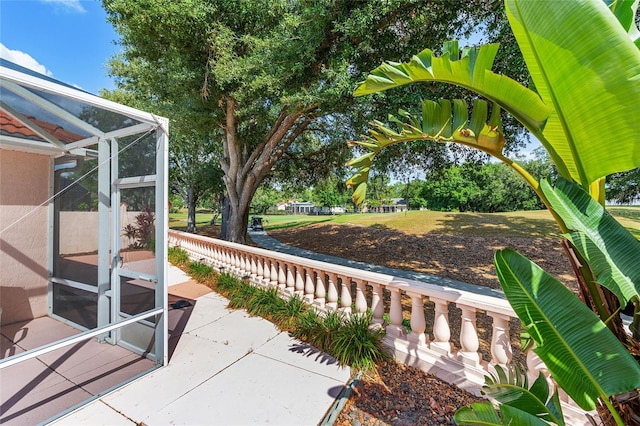 view of patio with a lanai