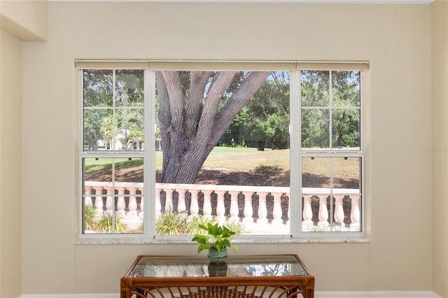 interior space featuring baseboards