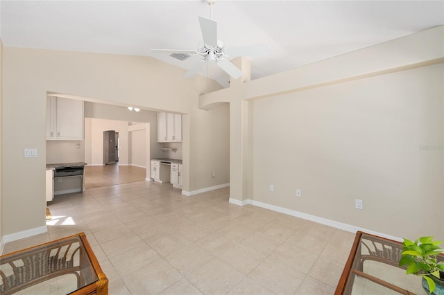 unfurnished living room featuring a ceiling fan, visible vents, baseboards, lofted ceiling, and light tile patterned flooring