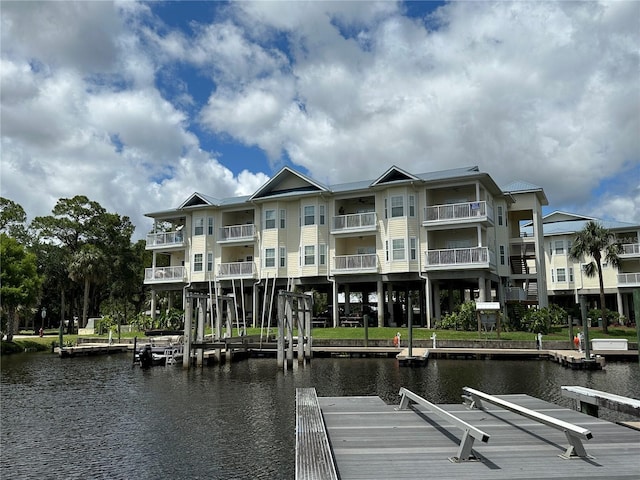 54 SE 910th Ave Unit 210/3, Suwannee, FL 32692 - view of building exterior with a water view