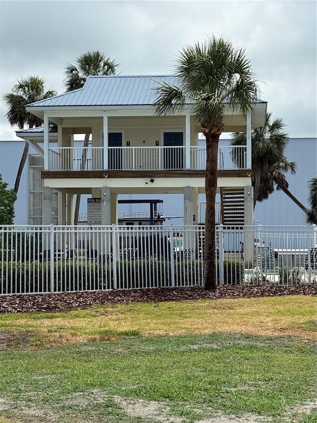 54 SE 910th Ave Unit 210/3, Suwannee, FL 32692 - rear view of house with a balcony