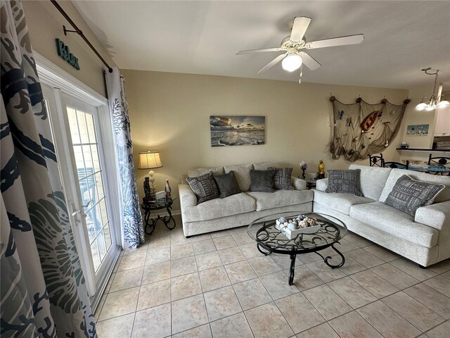 54 SE 910th Ave Unit 210/3, Suwannee, FL 32692 - tiled living room with a ceiling fan and a chandelier
