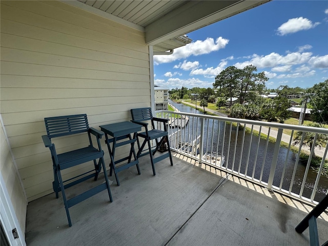 54 SE 910th Ave Unit 210/3, Suwannee, FL 32692 - balcony featuring a water view