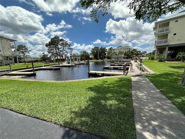 54 SE 910th Ave Unit 210/3, Suwannee, FL 32692 - dock with a water view and a lawn