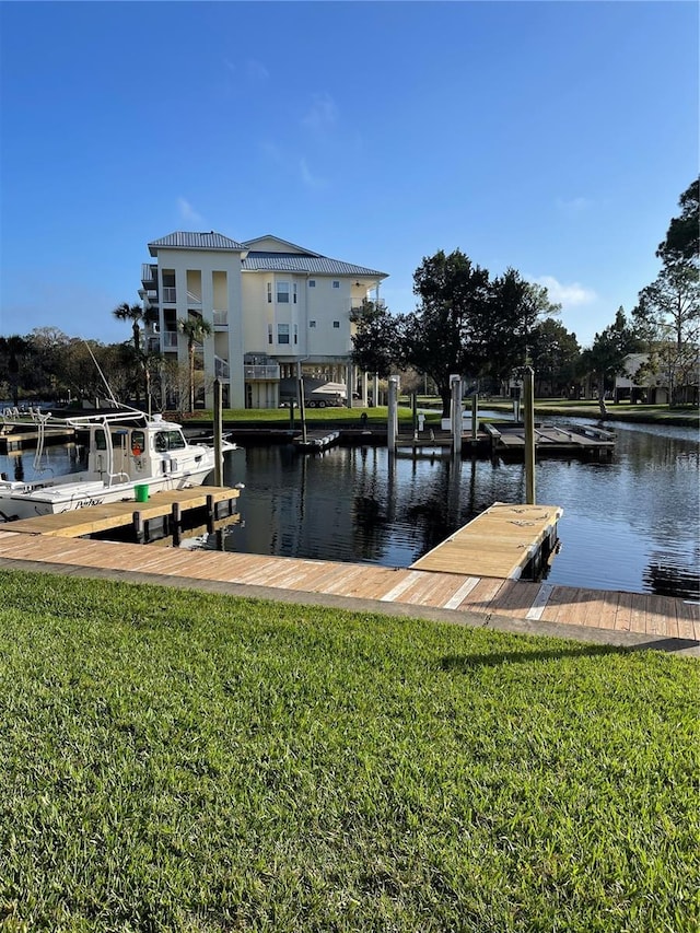 54 SE 910th Ave Unit 210/3, Suwannee, FL 32692 - dock with a water view and a lawn