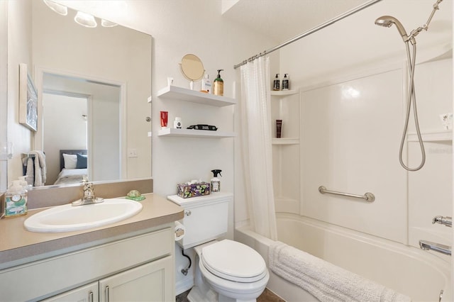 ensuite bathroom featuring vanity, toilet, ensuite bathroom, and shower / tub combo