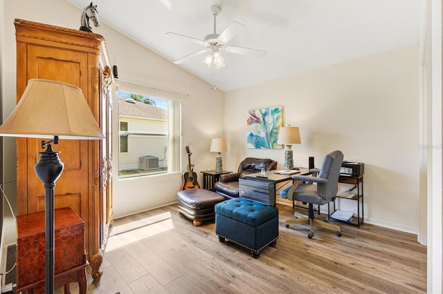 living area featuring ceiling fan, baseboards, lofted ceiling, and light wood-style floors