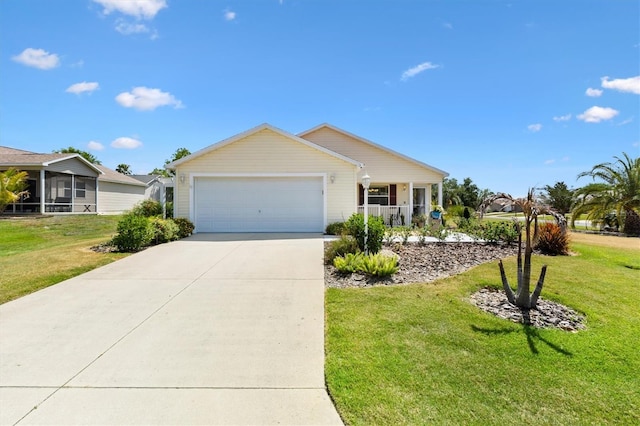 ranch-style home featuring a garage, covered porch, driveway, and a front lawn