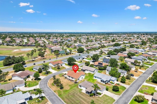 aerial view with a residential view and a water view
