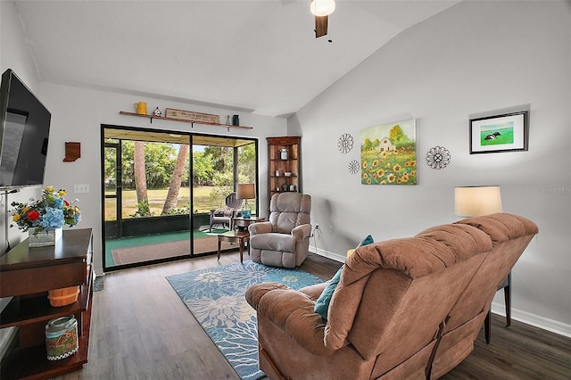 living room with ceiling fan, baseboards, vaulted ceiling, and wood finished floors