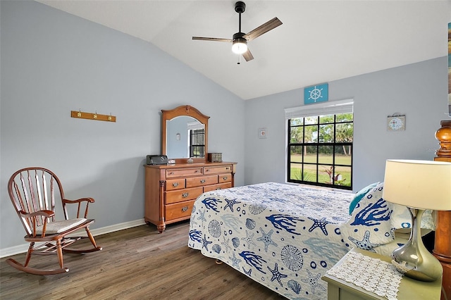 bedroom featuring ceiling fan, baseboards, vaulted ceiling, and wood finished floors
