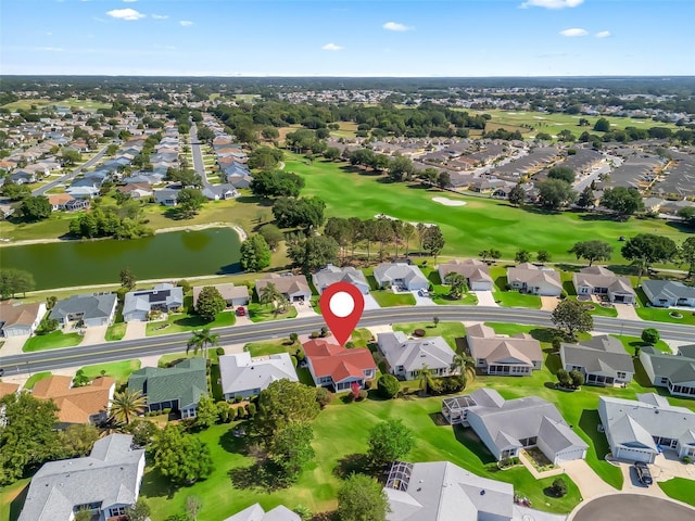aerial view with a water view, golf course view, and a residential view